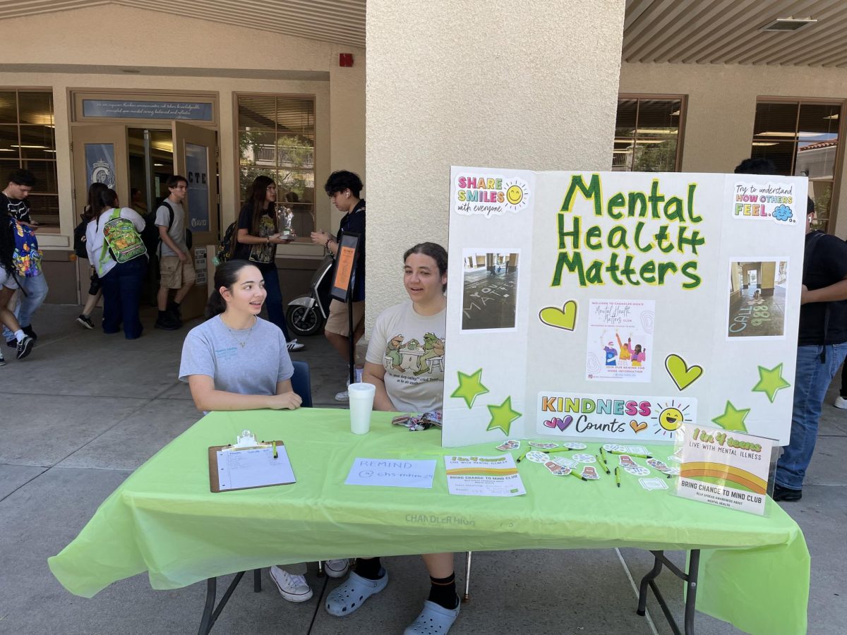 Adriana Gildea and Zadie Rudnick, seniors, sit at the Mental Health Matters table during CHS Club Fair on Wednesday, August 14, 2024.