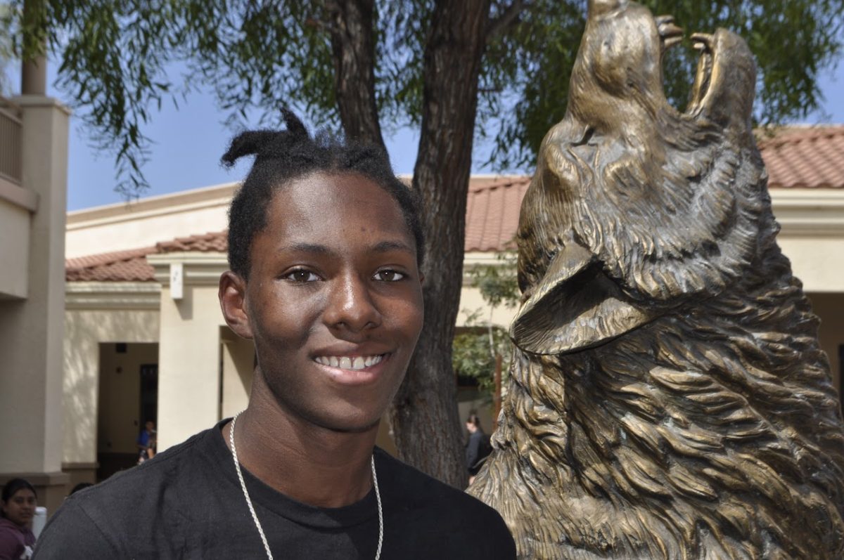 Zaire Brown poses for a portrait in the courtyard after an Open Mic event in the Jones Student Union. Brown performed a cover of John Legend's "Nervous".