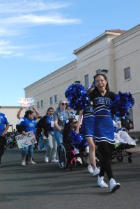 Chandler High School students participate in the 2024 Homecoming Parade.