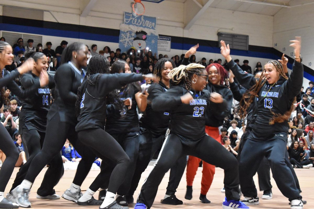 Chandler High’s Girls Basketball team 
players cheer on their teammates at 
Winter Assembly on Friday, December 6, 2024.