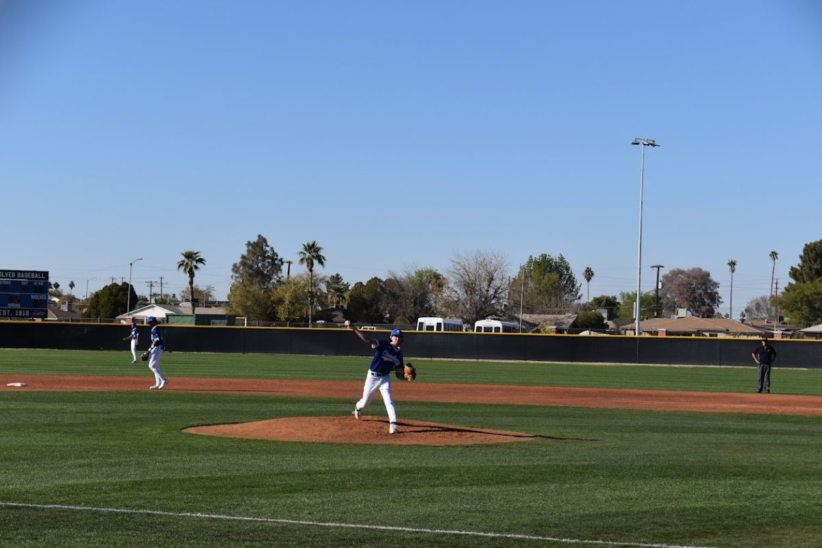 Jackson Durham, senior, throws the starting pitch of Chandler's game against Sandra Day O'Connor High School on February 26, 2025.