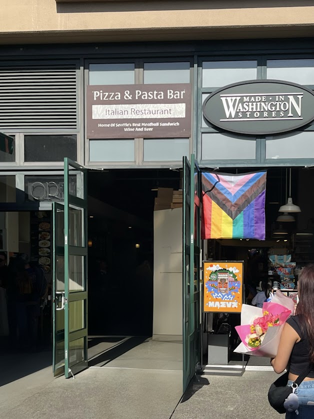A Pride flag hangs outside a restaurant in Seattle, Washington.