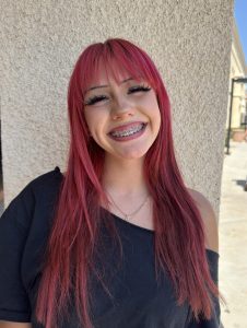 Mia Salinas smiles for the camera.
