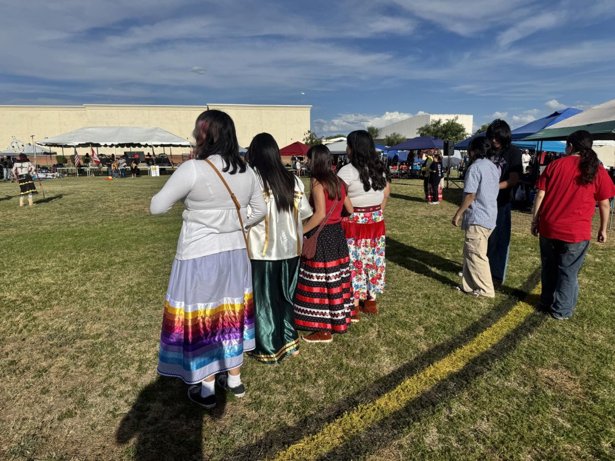 Participants prepare to dance in the circle as the drummers start to beat the drum at the CUSD Powwow on April 11, 2026. Photo courtesy of Rosemary Liversedge.